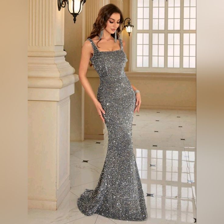 New Glam Sequin Velvet Bodycon Mermaid Train Gown Dress * Sleeveless * Wide Strap * Princess Square Neck * High Waist * Mermaid Hem With Small Train * Back Zip *Approximate Unstretched Measurements* Small (4) * Bust 33.5"(Up To 35.25") * Waist 25.25"(Up To 27.5") * Length 60.25" Medium (6) * Bust 35"(Up To 37") * Waist 26.75"(Up To 29") * Length 60.5" Large (8/10) * Bust 37.25"(Up To 39.5") * Waist 29"(Up To 31.5") * Length 61" Xl (12) * Bust 39.75"(Up To 41.75")" * Waist 31.5"(Up To 33") * Leng Old Hollywood Evening Gowns, Silver Dress Long, Mardi Gras Date, Silver Grey Dress, Grey Gown, Gown Ideas, Glittery Dress, Silver Gown, Formal Dance