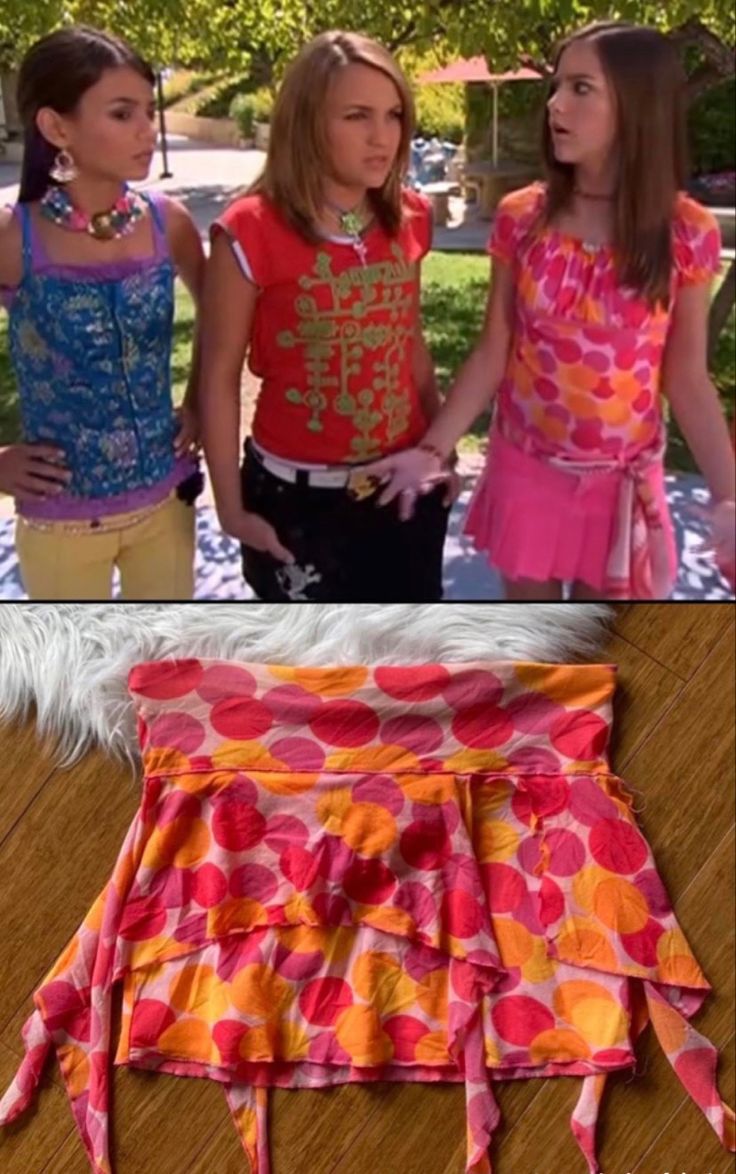 two girls are standing next to each other and one is wearing a skirt with flowers on it