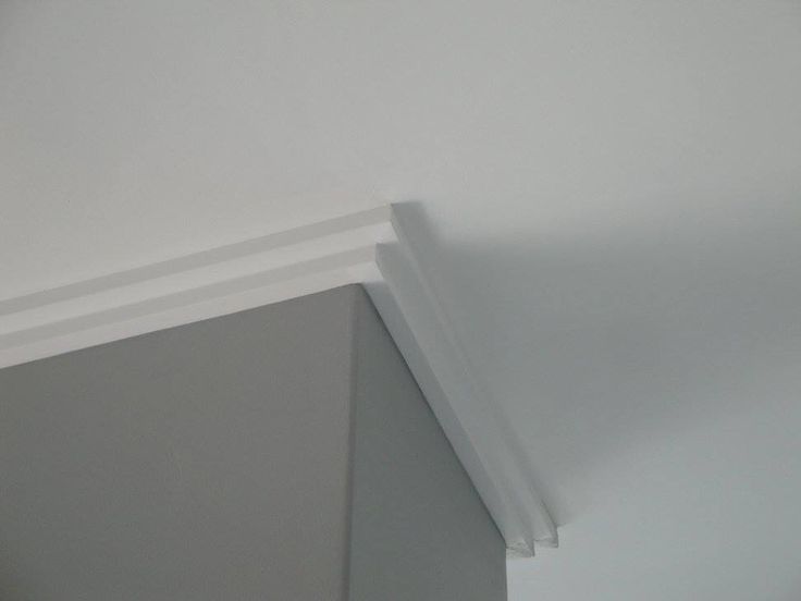 the corner of a room with white trim