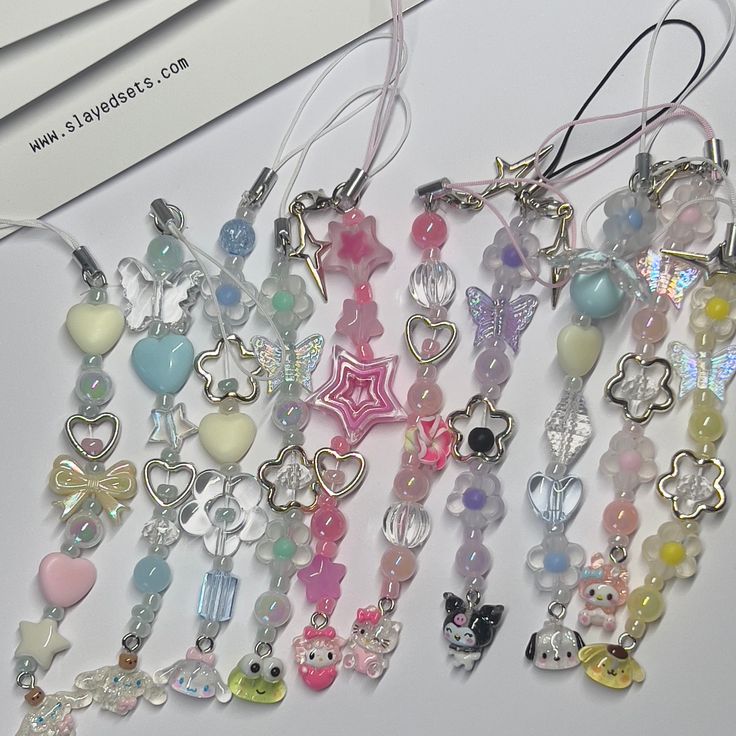 a bunch of charms that are on a table