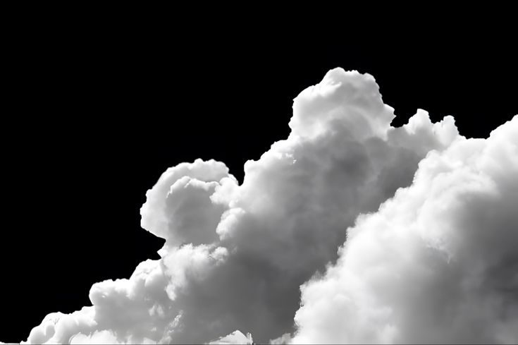 an airplane is flying through the clouds in black and white