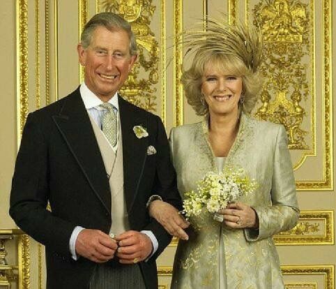 the prince and princess of wales are standing next to each other