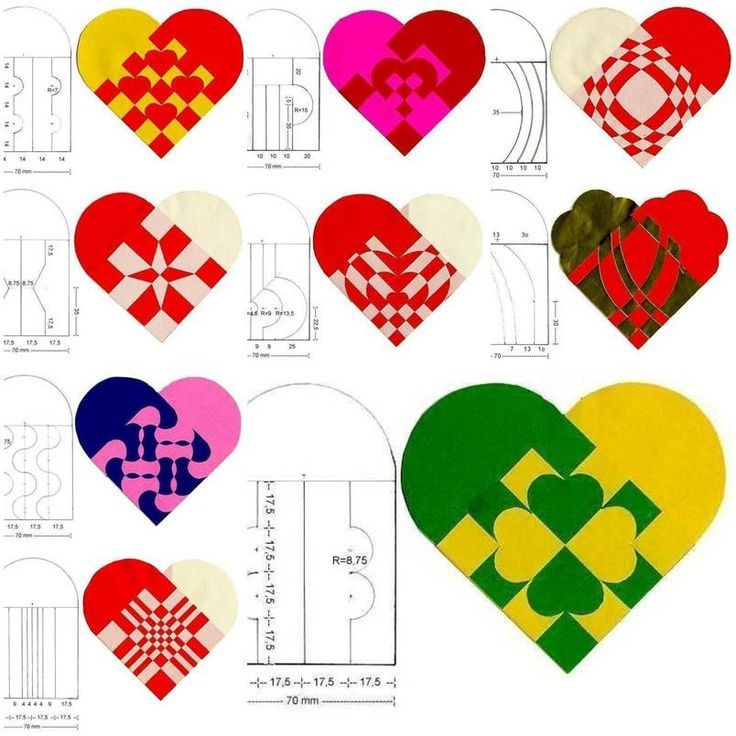 an image of paper hearts that are cut out and placed in different colors on a white background