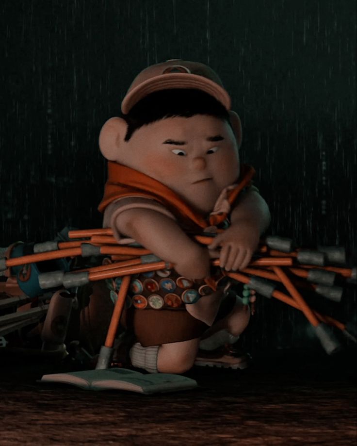 the animated character is holding many sticks in his hands and looking at something on the ground