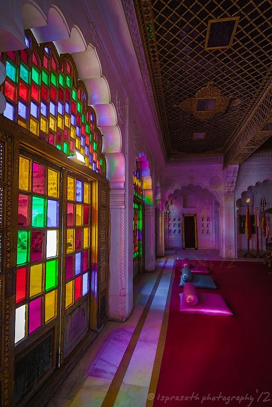 a room with stained glass windows in it