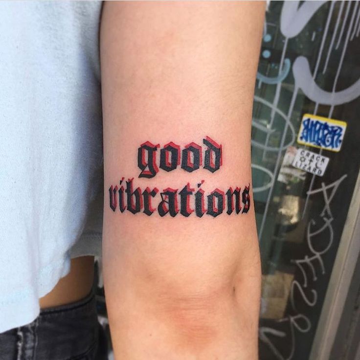 a person with a tattoo on their arm that says, good titratons