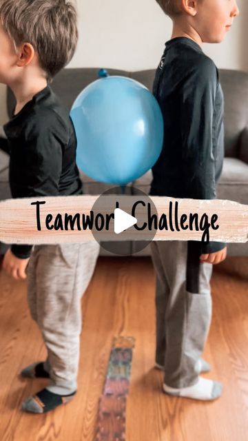 two young boys standing in front of a couch with balloons and the words teamwork challenge