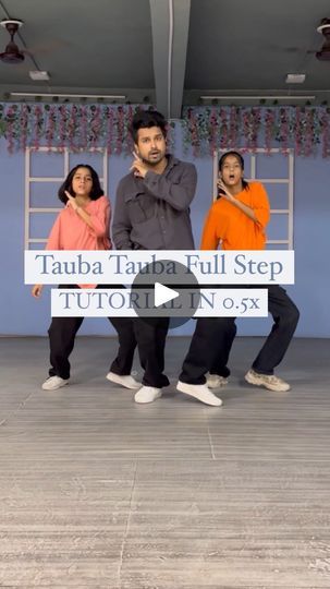 three people standing in front of a blue wall with the words tabba tare full step