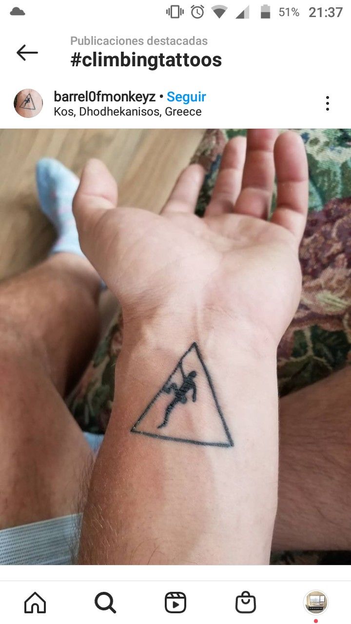 someone has a tattoo on their arm that says climbing tattoos, but it looks like they are