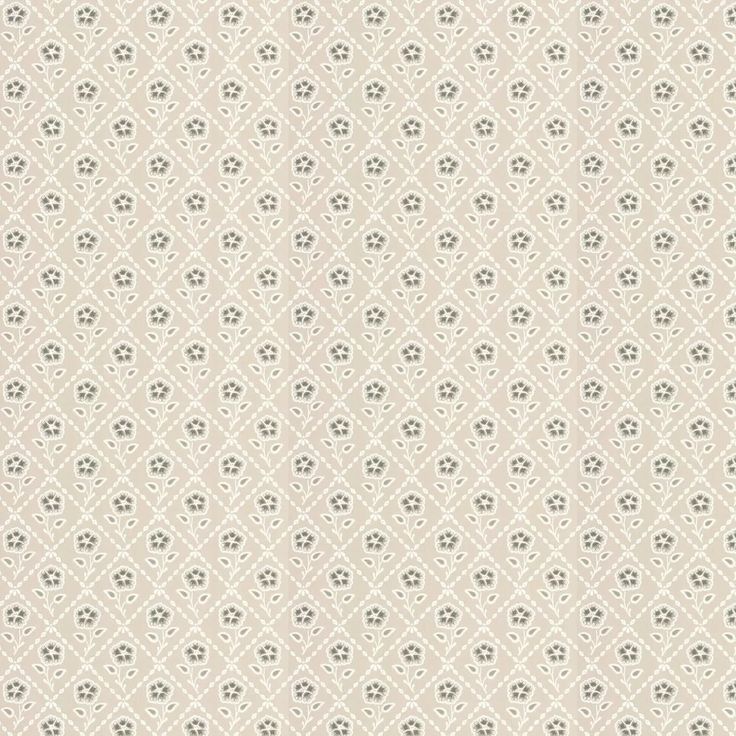 a beige and white wallpaper with small flowers