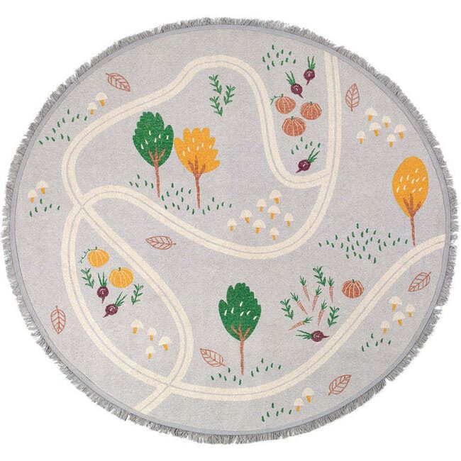 a round rug with various trees and flowers on the side, in grey color is shown