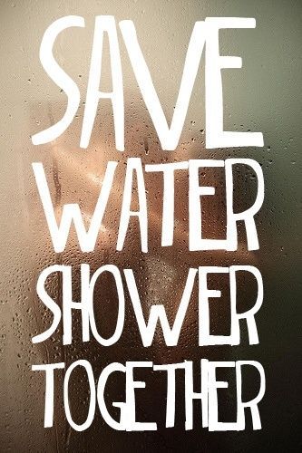 the words save water shower together written in white