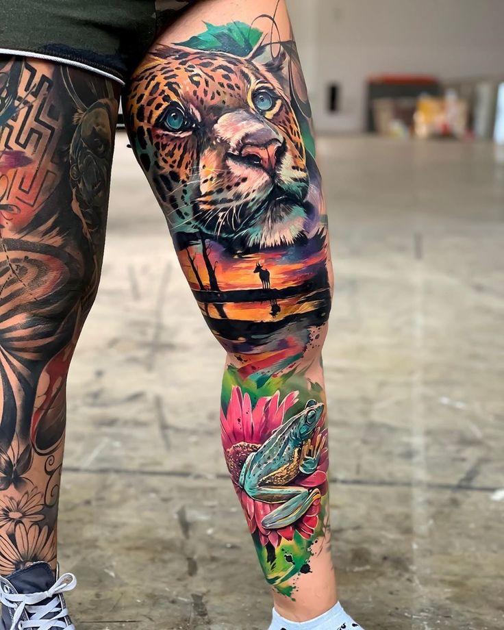 a person with tattoos on their legs