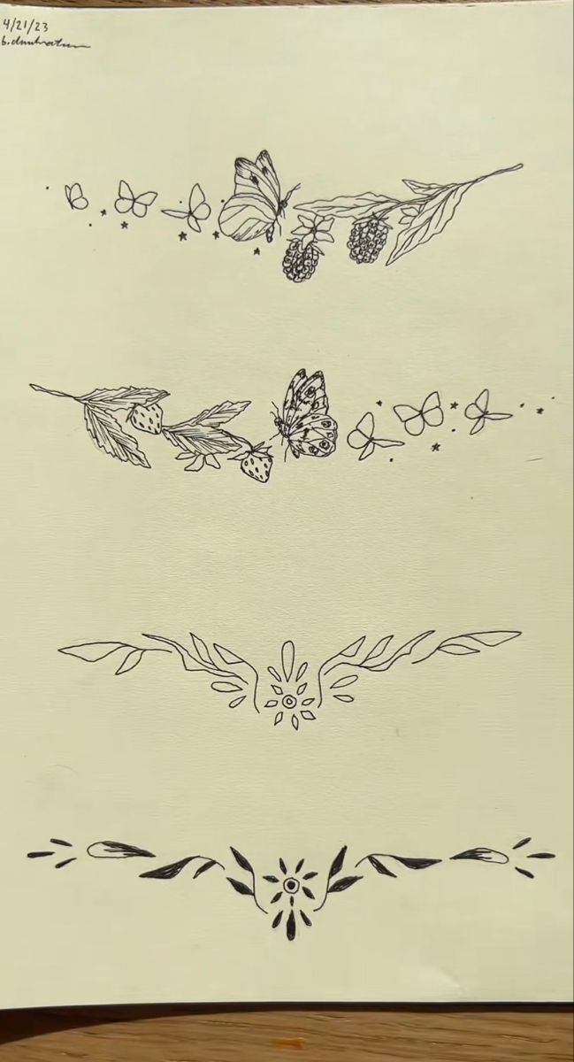 an ink drawing of flowers and leaves on a piece of paper with writing underneath it