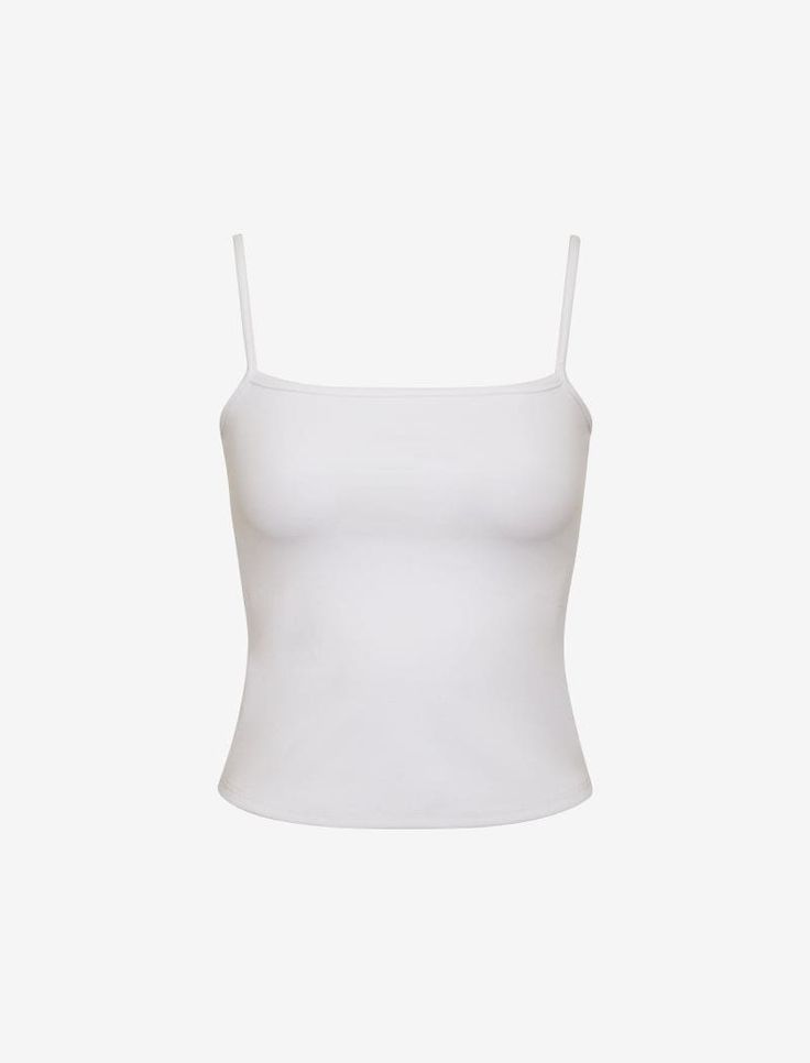 This everyday tank is the definition of essential. Once you feel the super soft, buttery fabric that’s thick and compressive—you’ll be so obsessed. It’s minimal, effortless, and flattering enough to wear on repeat. Simple White Top, White Tank Top Png, White Basic Top, Top Png, Essential Tops, Knit Outerwear, Tank Top White, Preppy Girl, Crop Top Outfits