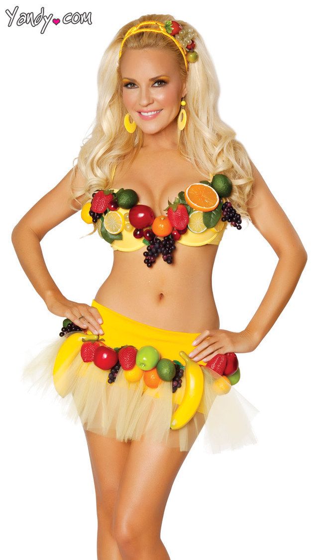 a woman in a fruit costume is posing for the camera with her hands on her hips