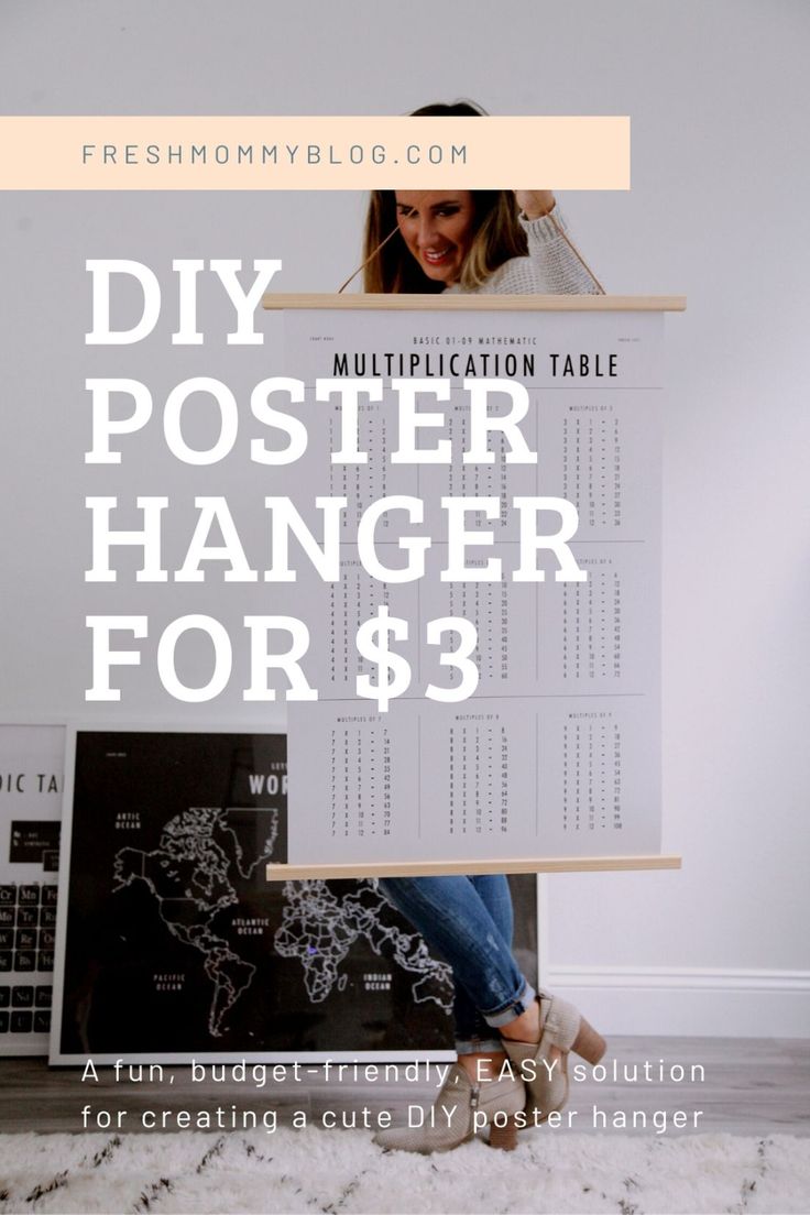 the diy poster hanger for $ 3 is on display in front of a white wall