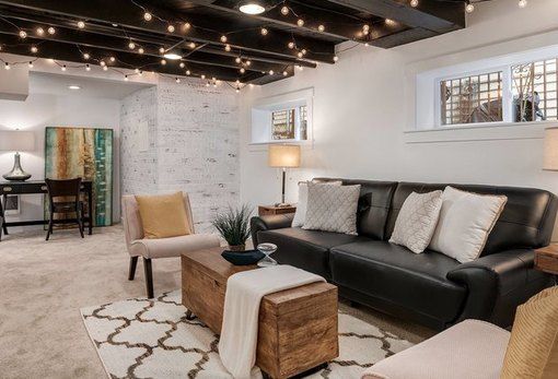 a living room filled with furniture and lights