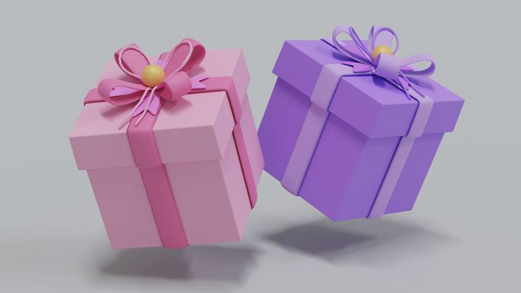 two colorful gift boxes with bows on them are sitting side by side, one is pink and the other is purple