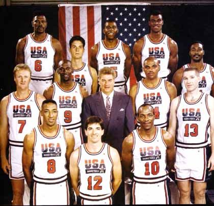 the usa basketball team is posing for a group photo in front of an american flag