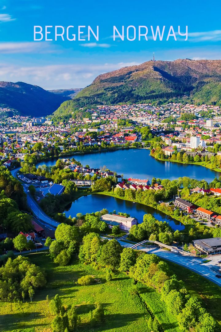 an aerial view of a town and river with the words bergen norway above it