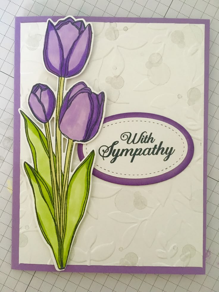 a close up of a card with flowers on it