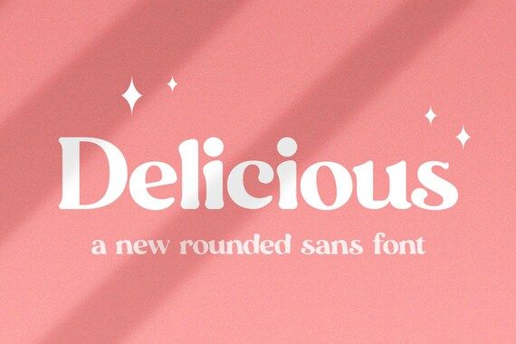 a pink background with the word delicious written in white