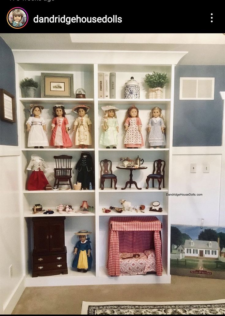 there are many dolls on the shelves in this room