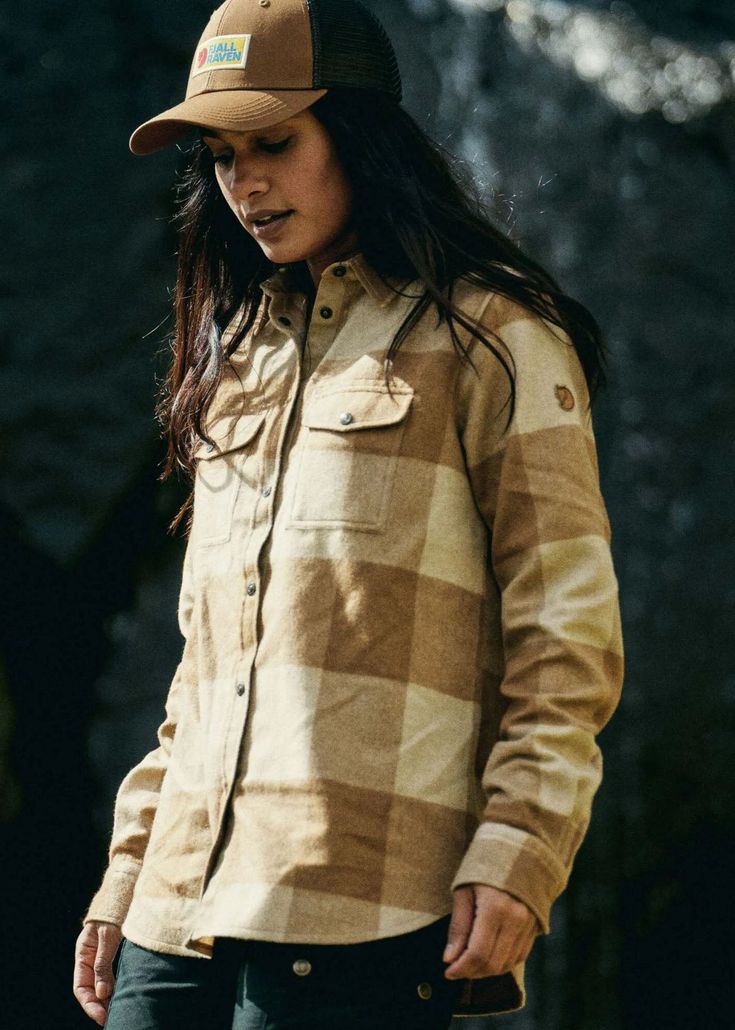 Every great women deserves a great flannel. We love the comfortable, warm long-sleeved Canada shirt from Fjallraven. The Canada shirt is made with recycled wool. A Details in G-1000 Eco on the inside of the collar, cuffs, pocket flaps, and front opening. Works well as both a light jacket on mild autumn days and as a robust insulating mid-layer over a base layer top. Best for: Fall Transition Layer Cold Winter days as a mid layer Materials: G-1000® Eco: 65% polyester, 35% cotton 70% wool, 30% pol Womens Flannel Outfit, Canada Shirt, Autumn Days, Outdoor Pants, Flannel Women, Great Women, Womens Long Sleeve Shirts, Sweaters Knitwear, Womens Clothing Sizes