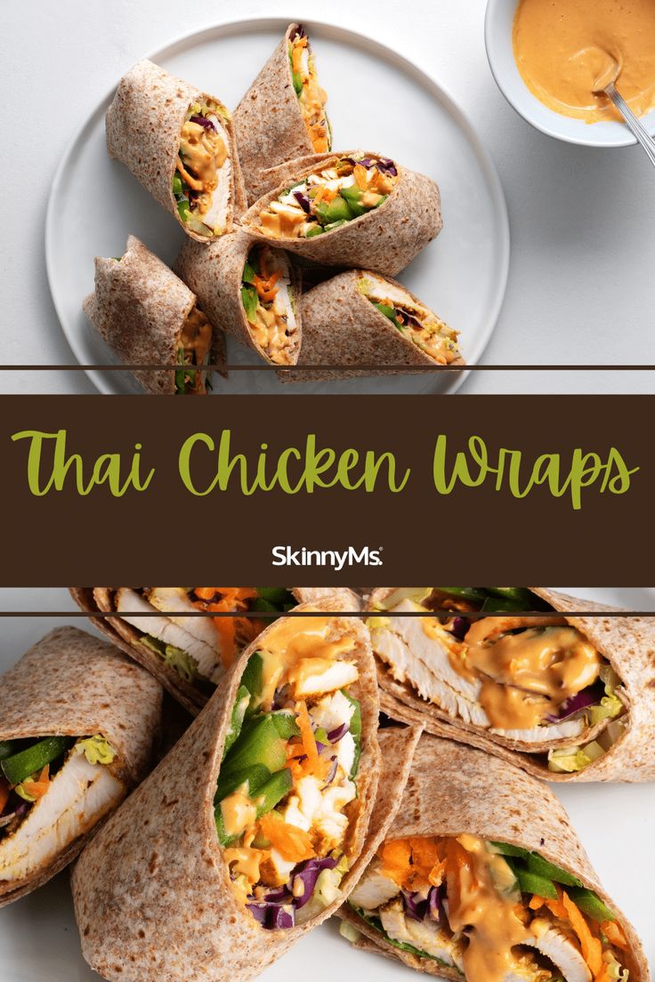 chicken wraps on a plate with dipping sauce