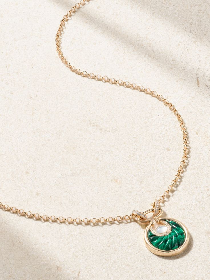 L'Atelier Nawbar's collections are filled with modern heirlooms. Handcrafted from 18-karat gold, this 'Circus Moon' necklace is strung with a small pendant that features a carved crescent-shaped malachite framed by a halo of diamonds and lustrous pearl at its center. Gold-plated Round Emerald Necklace, Gold Plated Round Emerald Necklace, Round Gold Plated Emerald Gemstone Necklace, Round Gold Plated Emerald Necklace, Green Moon Charm Round Necklace, Green Moon Charm Necklace, Green Necklace With Moon Charm, Small Pendant, Watch Gifts