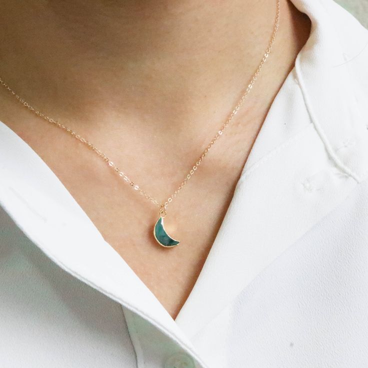 "*PRODUCT DETAIL* ✧ Moon shaped natural emerald gemstone necklace ✧ Available in gold filled chain. ✧ Pendant : 13mm, Gold plated ✧ Double wrap chain option: It's longer version of the chain that's designed to give extra wrap around your neck. Ex: Pendant of 29\" chain is designed to fit as 14.5\" length of necklace after it's wrapped around your neck. *Crescent gemstone options* -AMETHYST (February birthstone) -AQUAMARINE (March Birthstone) -EMERALD (May birthstone) -MOONSTONE (June birthstone) 14k Gold Filled Moon Charm Necklace As A Gift, Green Necklace With Moon Charm, Green Moon Charm Round Necklace, Turquoise Jewelry With Moon Charm For Gift, Green Moon Charm Necklace, Dainty Moon-shaped Birthstone Necklace, Dainty Moon Shaped Birthstone Necklace, Green 14k Gold Filled Necklace For Gift, 14k Gold Filled Green Necklace Gift