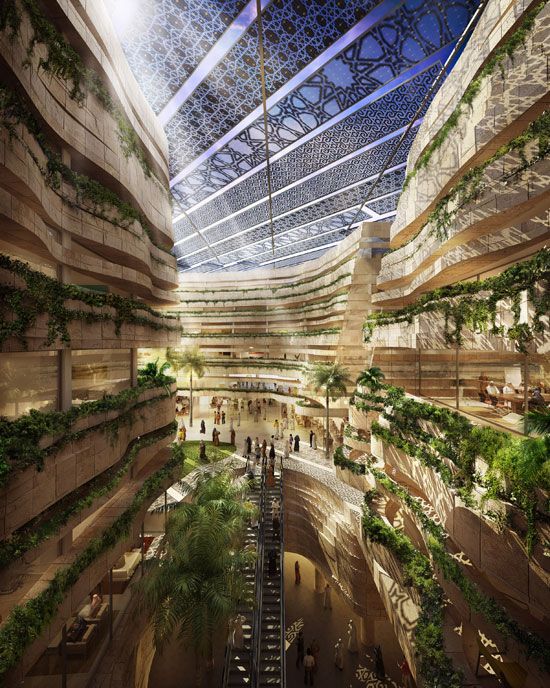 an atrium with plants growing on the ceiling