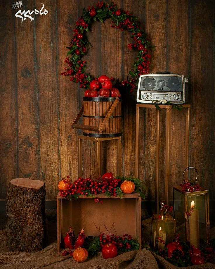 a wooden crate with apples and other fruit on it