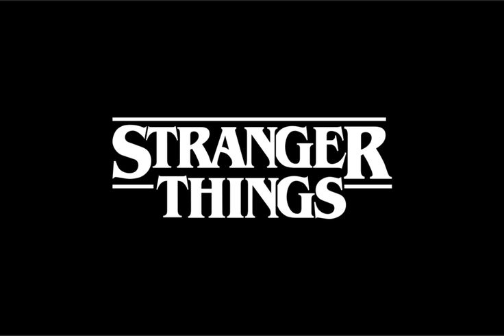 the logo for strange things, which is black with white letters and an orange outline