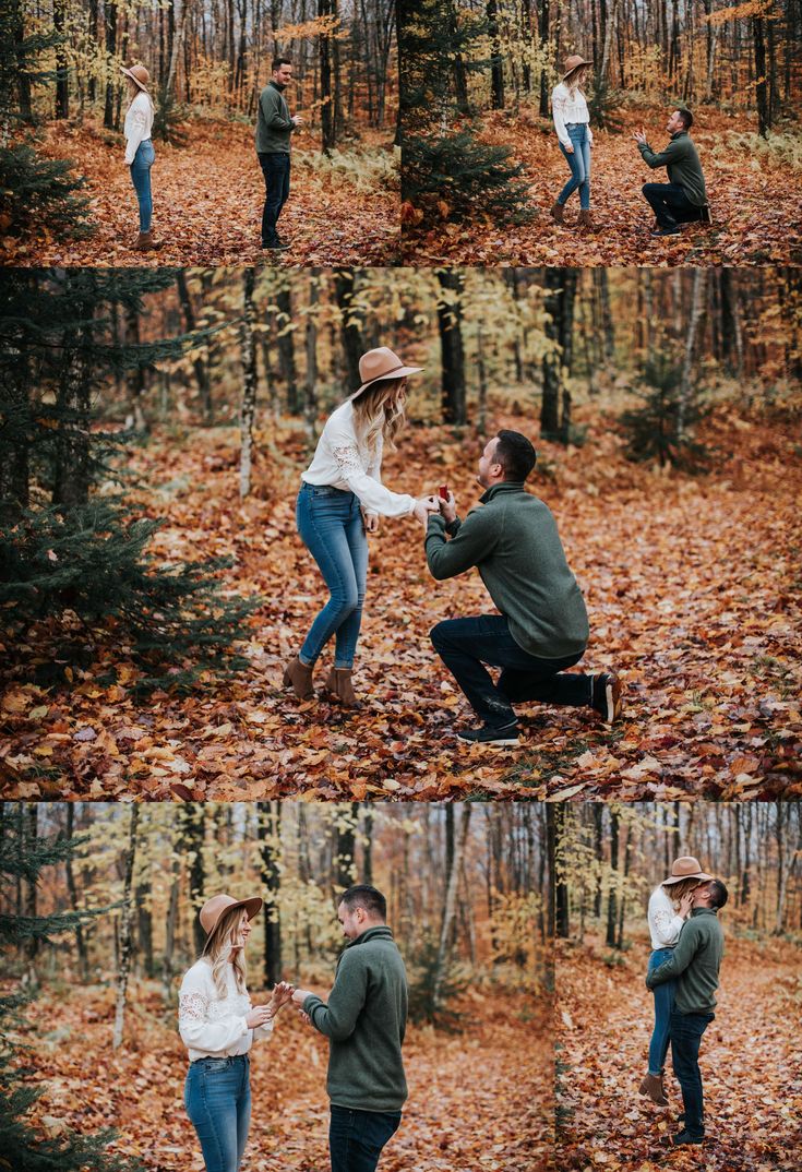 a man kneeling down next to a woman on top of a leaf covered ground in the woods