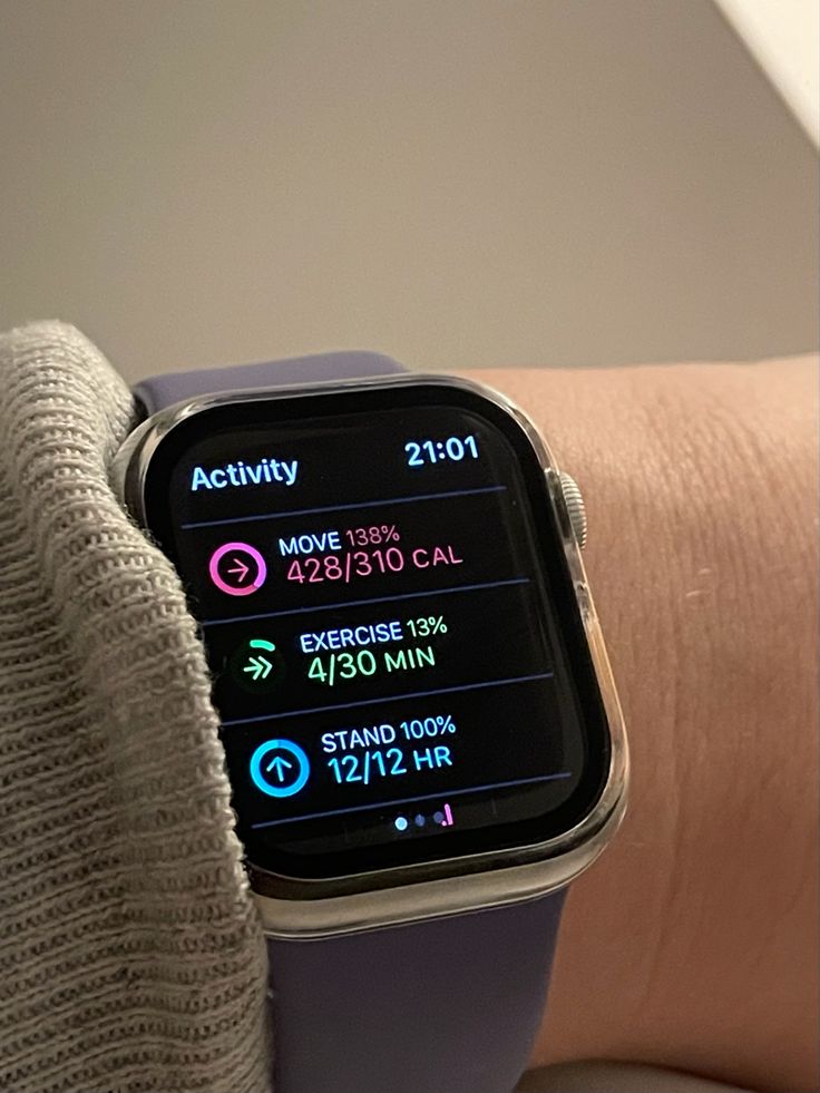 an apple watch displaying the activity on its screen