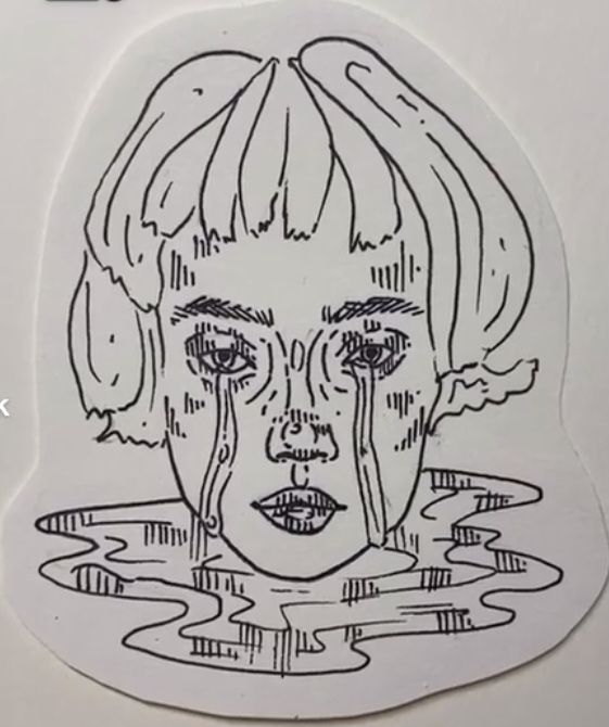 a drawing of a woman's face in water