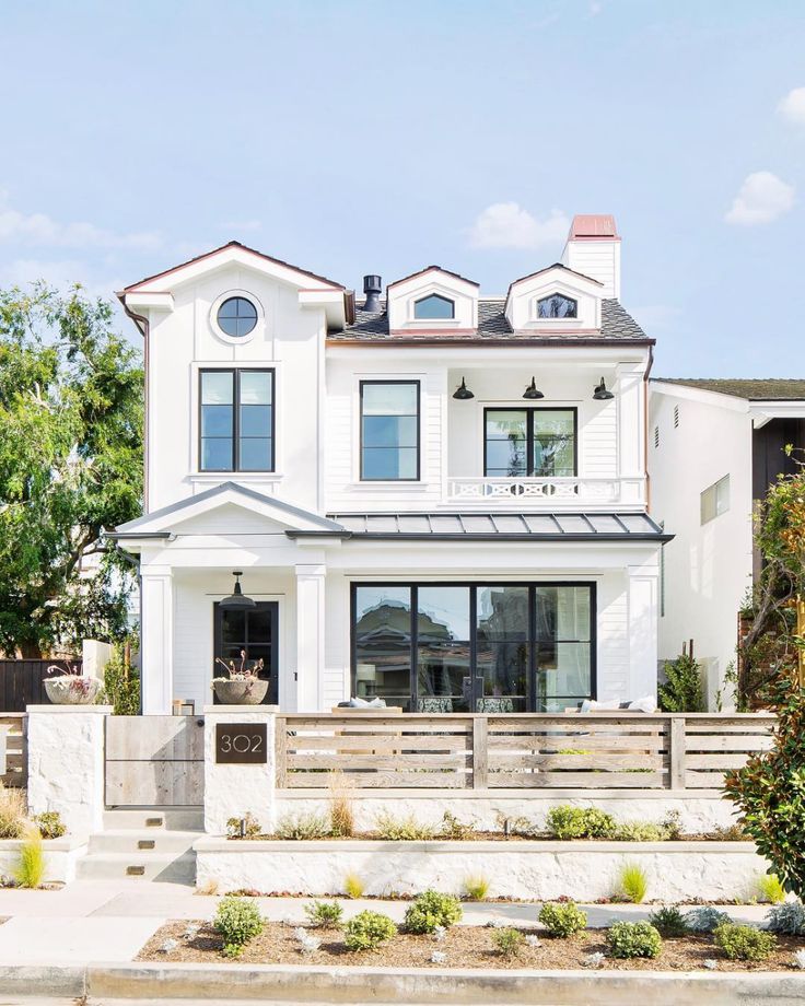 a large white house with lots of windows