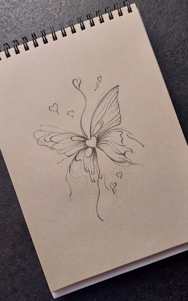 a drawing of a butterfly with hearts on its wings