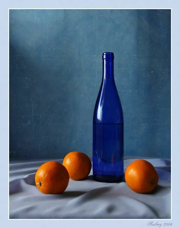 an oil painting of three oranges and a blue bottle