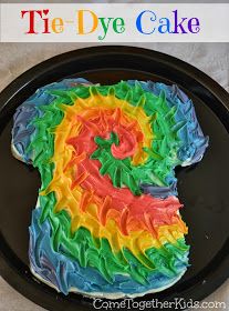 there is a colorful cake on the plate