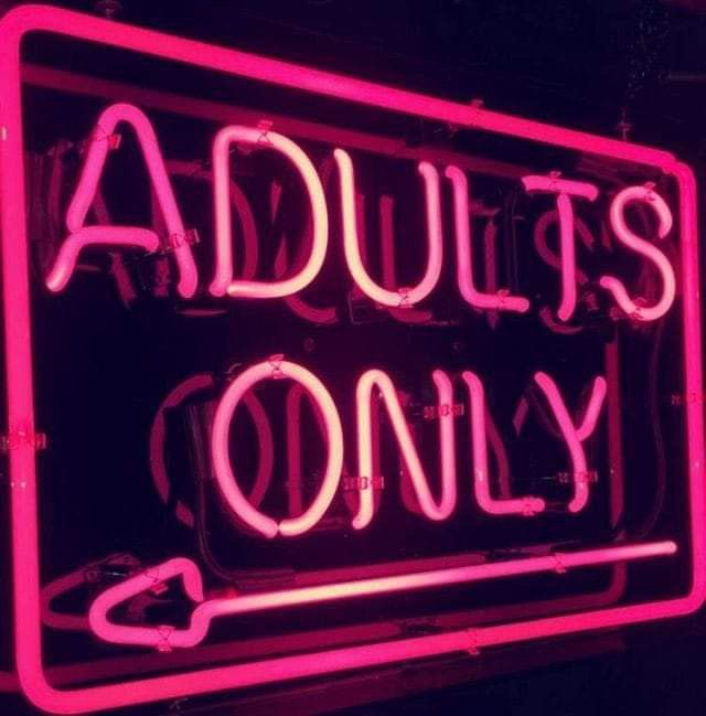 a neon sign with the words adults only written on it's front and side