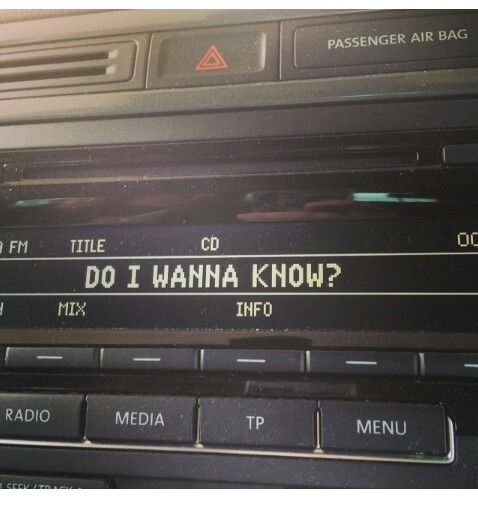 an old car radio with the words do i wanna know? written in black on it