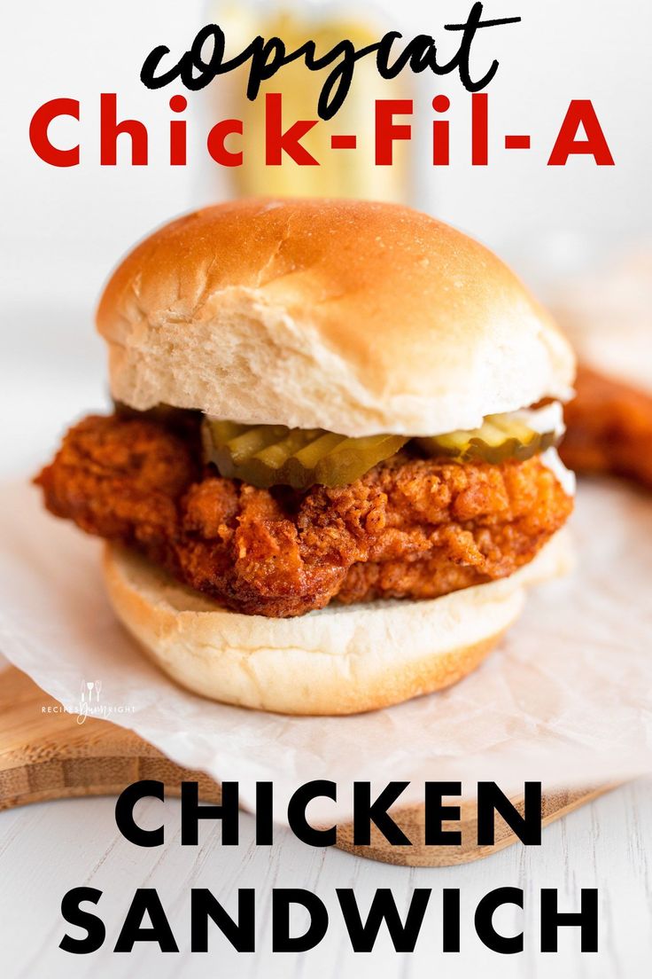 a chicken sandwich with pickles on it and the words copycat chick - fil - a