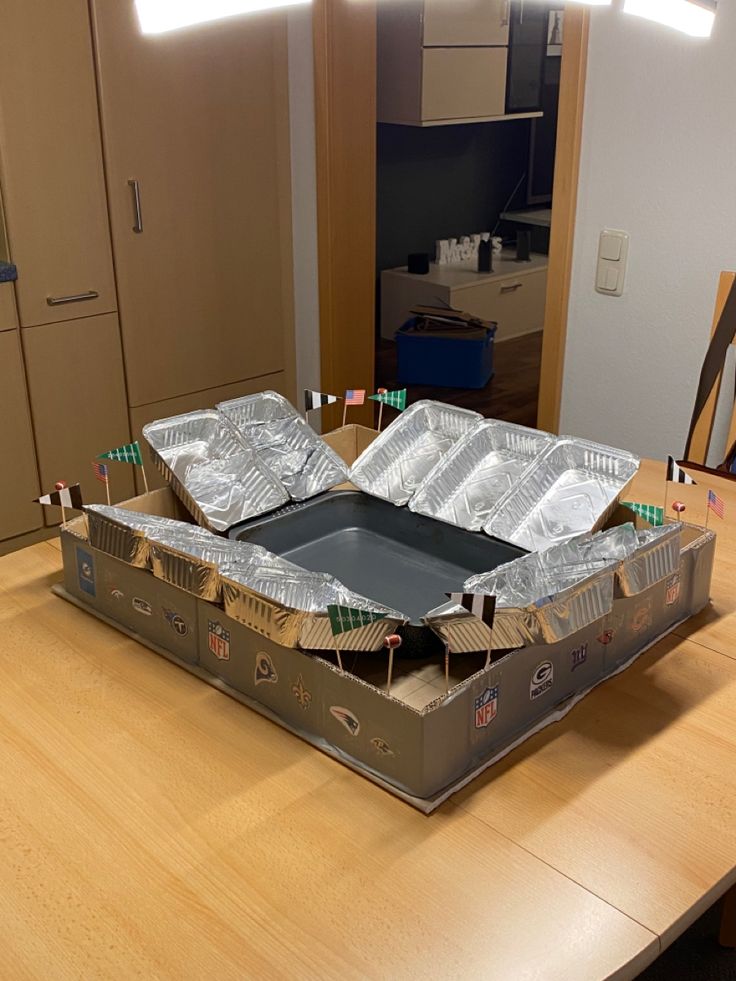 an open box sitting on top of a wooden table