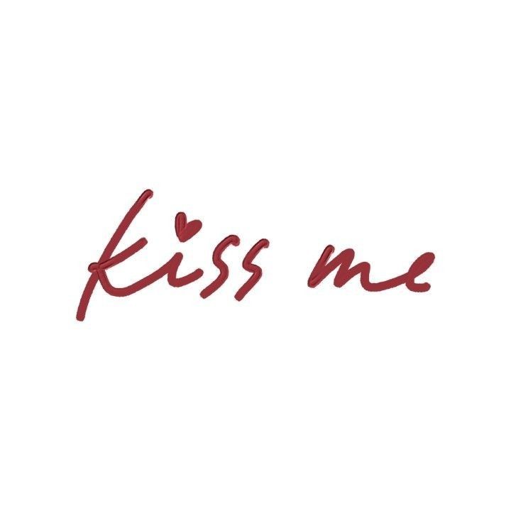 the word kiss me written in red ink