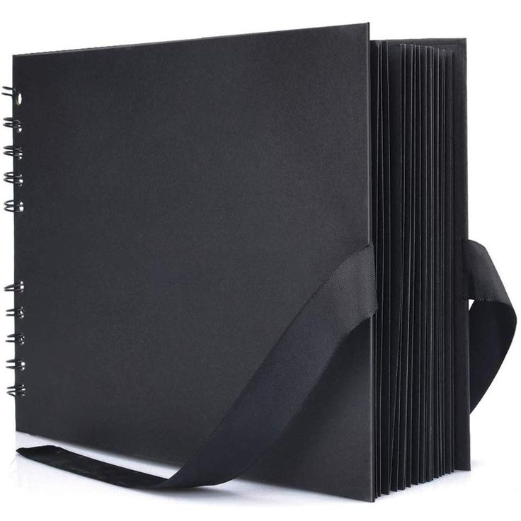 a black binder with ribbon on the front and bottom, sitting next to a white background