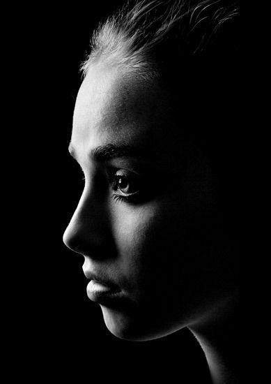 a black and white photo of a woman's face