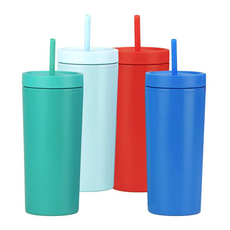 three different colored tumblers with straws on each one and the same color lid